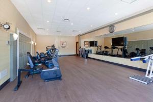 a gym with treadmills and cardio equipment in a room at Best Western Summit Inn in Niagara Falls