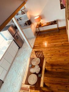 an overhead view of a room with a table and a chair at Utila Water Sports Deluxe Apt in Utila