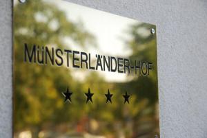 
a street sign with a picture of a man on it at Münsterländer Hof in Cloppenburg
