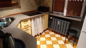 Kuchyň nebo kuchyňský kout v ubytování FEIDUM quarters rooms