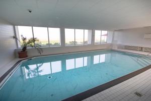 Bazén v ubytování Haus am Sahlenburger Strand FeWo 15 nebo v jeho okolí