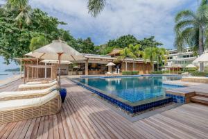 Swimmingpoolen hos eller tæt på Olive 1 Bedroom Beachfront