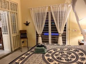 Postel nebo postele na pokoji v ubytování Villa CECILIA