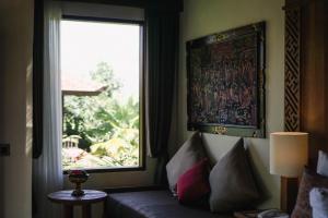 Ein Sitzbereich in der Unterkunft Sakti Garden Resort & Spa