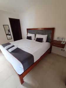 Postel nebo postele na pokoji v ubytování Hotel Beach Don Gonzalo