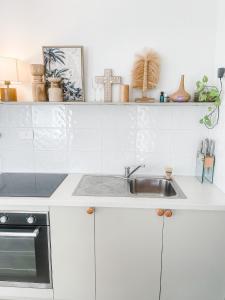Köök või kööginurk majutusasutuses Beach Bungalow Yeppoon