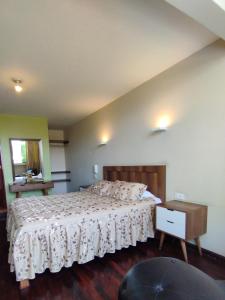Ένα ή περισσότερα κρεβάτια σε δωμάτιο στο Montreal Hostal