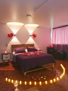 Ένα ή περισσότερα κρεβάτια σε δωμάτιο στο Montreal Hostal