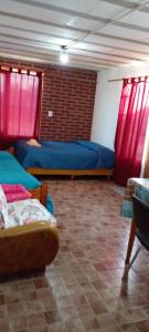 Posezení v ubytování Calendulas del Cabo