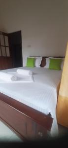 Ένα ή περισσότερα κρεβάτια σε δωμάτιο στο Seven Luck Palace