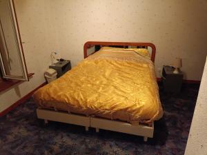 Ένα ή περισσότερα κρεβάτια σε δωμάτιο στο Chambre chez l'habitant Fruges