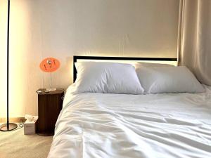 Hongdae Modern House客房内的一张或多张床位