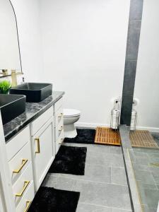 a bathroom with a sink and a toilet at Group Stay 3bd 2bth Ask about Deals in Birmingham