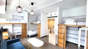 A bed or beds in a room at Grand Bay View Hotel