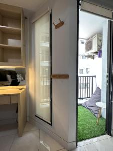 Postel nebo postele na pokoji v ubytování Apartment Taman Sari - Travelnesian Home + 8 fotografií