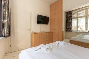 Ein Bett oder Betten in einem Zimmer der Unterkunft Villa Sirene 2-Raum Apartment, ca. 54 qm
