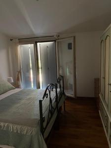 Postel nebo postele na pokoji v ubytování via Cappuccini 2b - soggiorna in centro a Gorizia con ascensore
