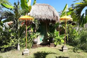 Zahrada ubytování Bali Beach Eco Villas Bali Batu Beach Hut