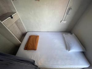 Ein Bett oder Betten in einem Zimmer der Unterkunft Lushy Hostel Nusa Penida
