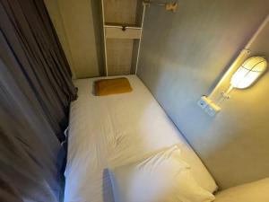 Ein Bett oder Betten in einem Zimmer der Unterkunft Lushy Hostel Nusa Penida