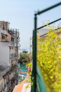 a view of a city from a train window at Penthouse No7 - #TIF Helexpo in Thessaloniki
