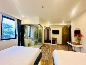 Llit o llits en una habitació de Memory Inn - Valley View