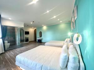 Llit o llits en una habitació de Memory Inn - Valley View