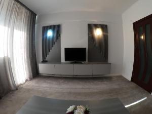 TV in/ali zabaviščno središče v nastanitvi Hotel Parc