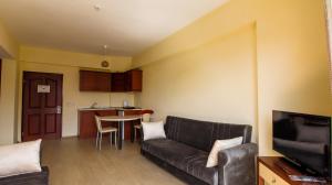 Posezení v ubytování LEMAS SUITE HOTEL
