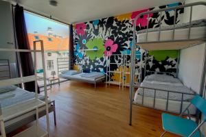 Postel nebo postele na pokoji v ubytování Heart of Gold Hostel Berlin
