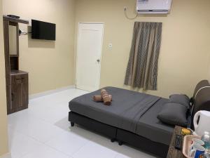 TV a/nebo společenská místnost v ubytování Maze Roomstay Langkawi