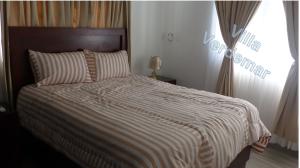 Postel nebo postele na pokoji v ubytování Villa Verdemar
