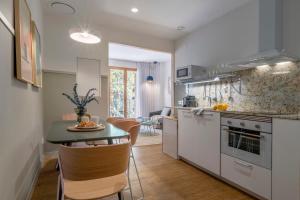 Kuchyň nebo kuchyňský kout v ubytování Aspasios City Oasis Apartments