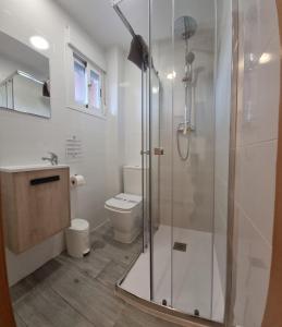 Koupelna v ubytování Homes of Spain, Apartamentos Paraíso Vera Playa, Ed Nuku Hiva, Bajo X con PISCINA PRIVADA y jardín privado a PIE de PLAYA , WIFI