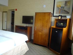 TV a/nebo společenská místnost v ubytování Sheridan Hotel