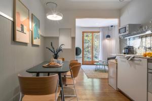 Kuchyň nebo kuchyňský kout v ubytování Aspasios City Oasis Apartments