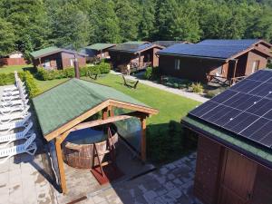 an aerial view of a house with solar panels at Kalabash Apartments in Sovata
