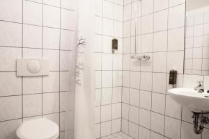 Koupelna v ubytování Fosshotel Baron