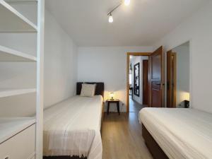 Voodi või voodid majutusasutuse Apartment Atlantic 112 by Interhome toas
