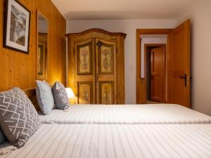 Ένα ή περισσότερα κρεβάτια σε δωμάτιο στο Apartment Baudrier A04 by Interhome