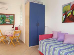 Ένα ή περισσότερα κρεβάτια σε δωμάτιο στο Apartment Adalgisa by Interhome