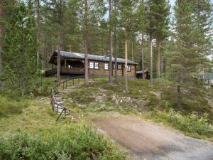 a house in the middle of a forest at Chalet Lofsdalen Furan by Interhome in Lofsdalen