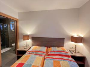 Postel nebo postele na pokoji v ubytování Apartment Mountain Resort-Kaprun by Interhome