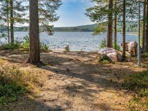 a campsite next to a body of water with trees at Holiday Home Hiisiranta b3 by Interhome in Kolinkylä