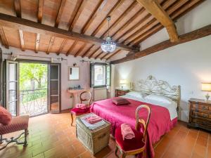 A bed or beds in a room at Holiday Home Vedi Torre by Interhome