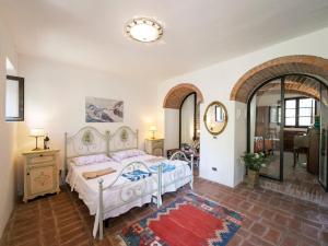 A bed or beds in a room at Holiday Home Vedi Torre by Interhome