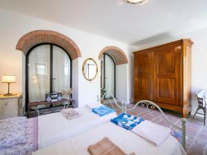A bed or beds in a room at Holiday Home Vedi Torre by Interhome