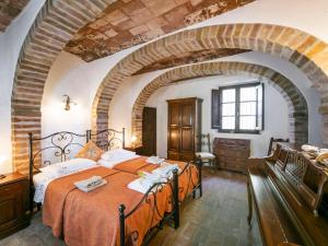 A bed or beds in a room at Holiday Home Vedi Torre by Interhome