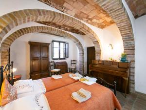A bed or beds in a room at Holiday Home Vedi Torre by Interhome