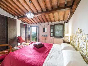 A bed or beds in a room at Holiday Home Vedi Torre by Interhome